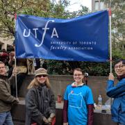 Photo of attendees at rally, including OCUFA and UTFA staff and executive members.